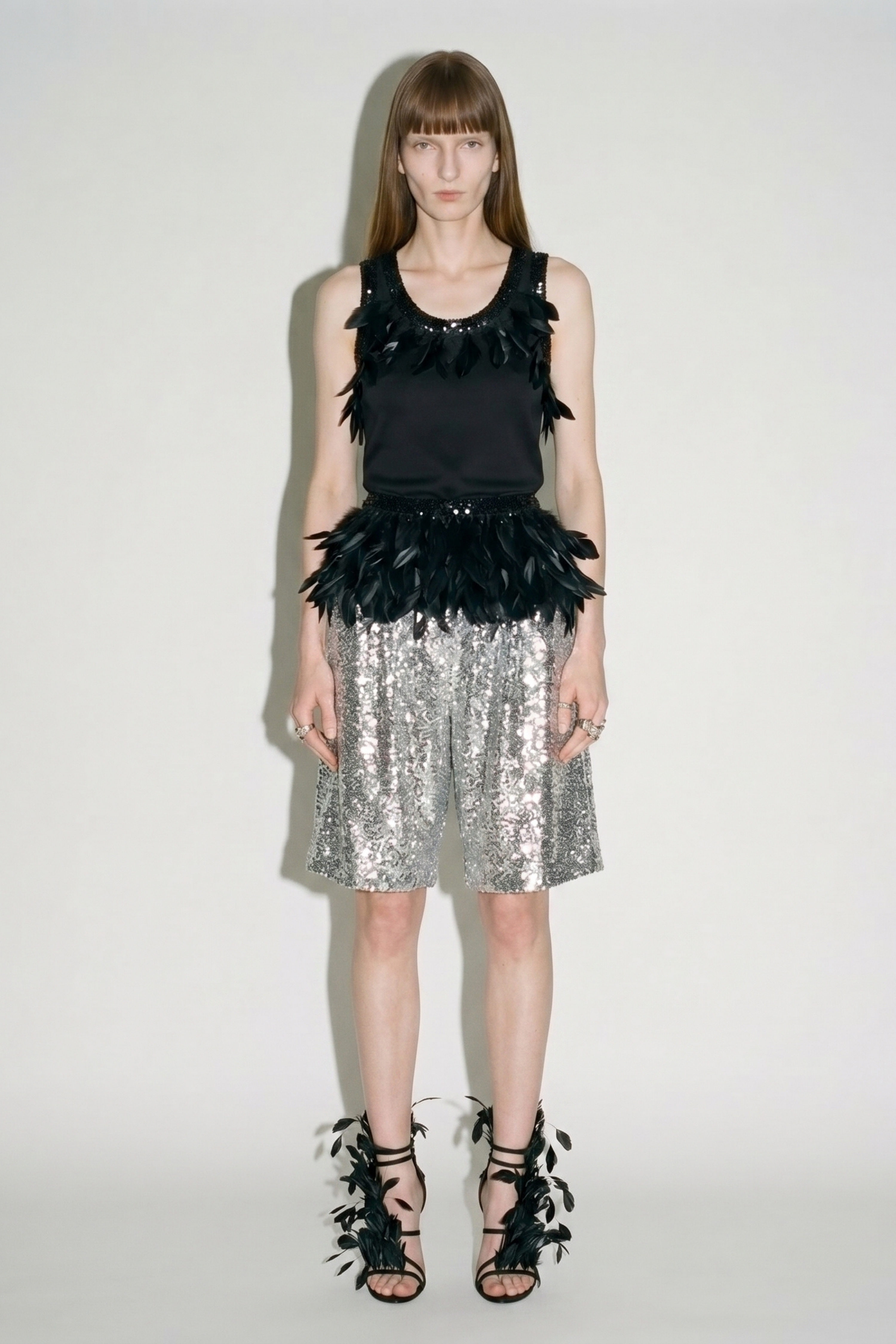 Black Feather Sequin Peplum Top
