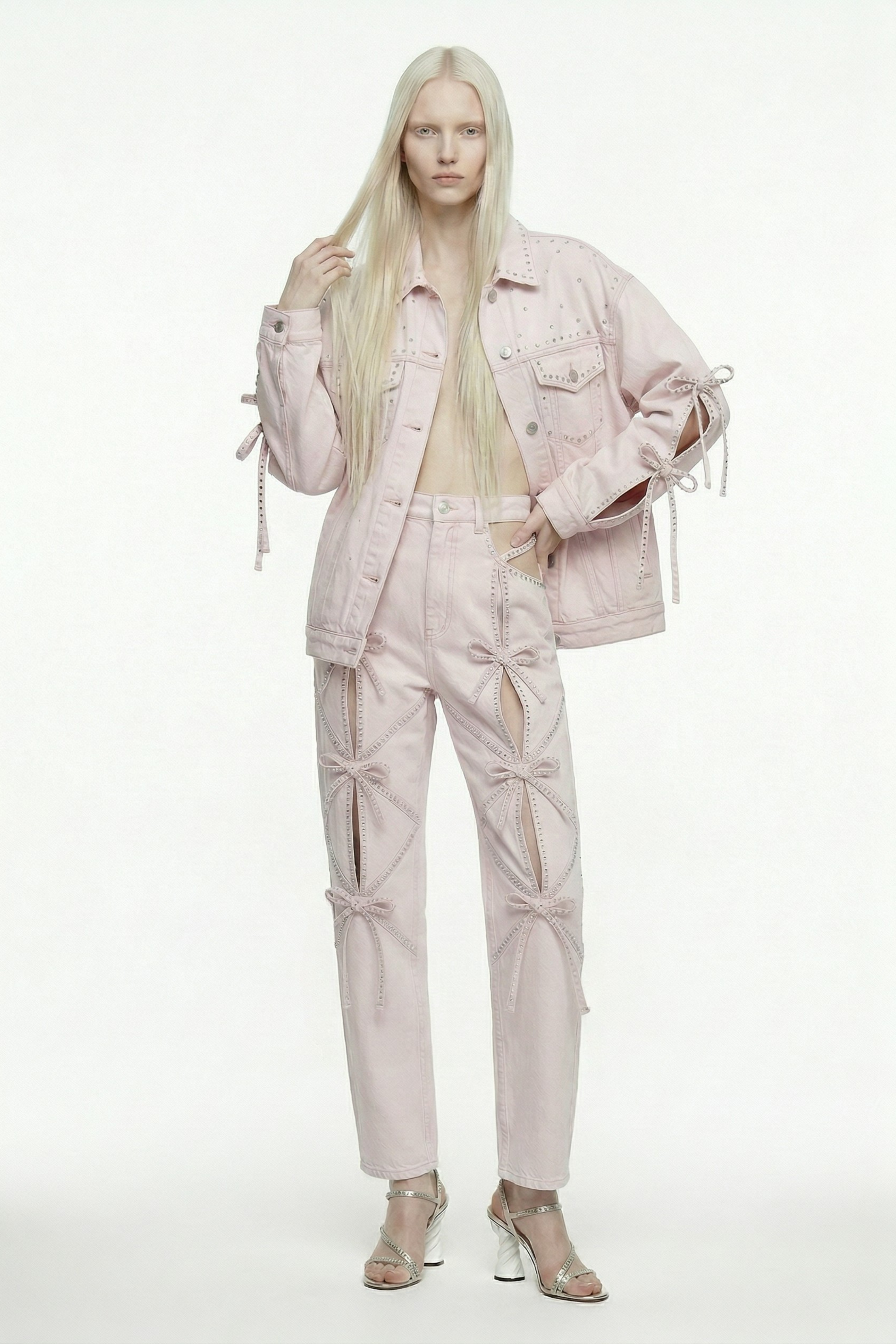 BOW CUT-OUT DENIM JEANS IN BLUSH